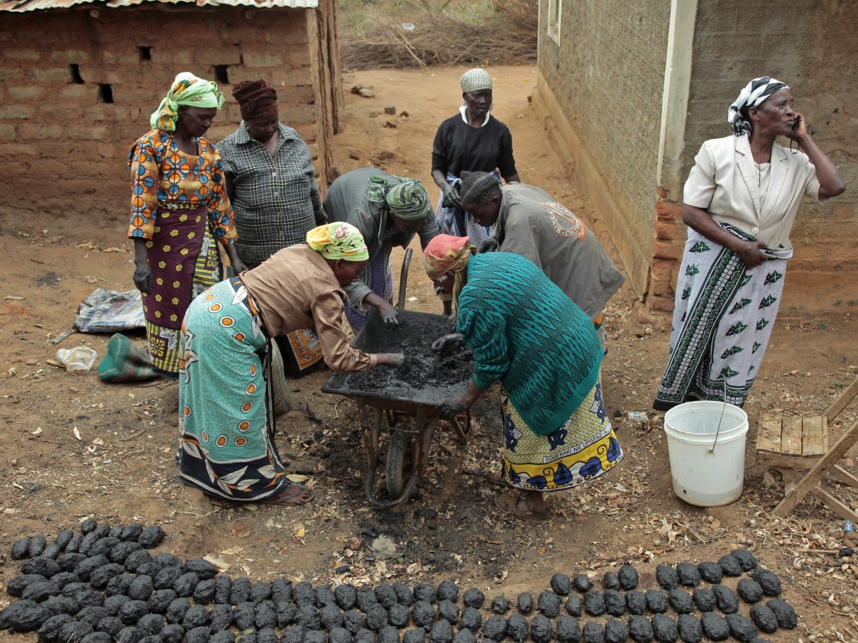 Martha Kimuyu Kinai, 68, started a woman's group when she was 18. She has 4 grandchildren and teaches her community how to make charcoal clay using wood charcoal and soil mixture. Martha is an example in Mumandu 15kms from Machakos near Nairobi, and has learned more business skills from Hand in Hand training.