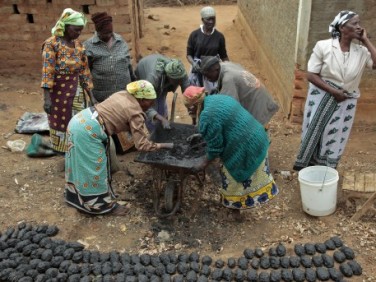 Members of the women's group working. 